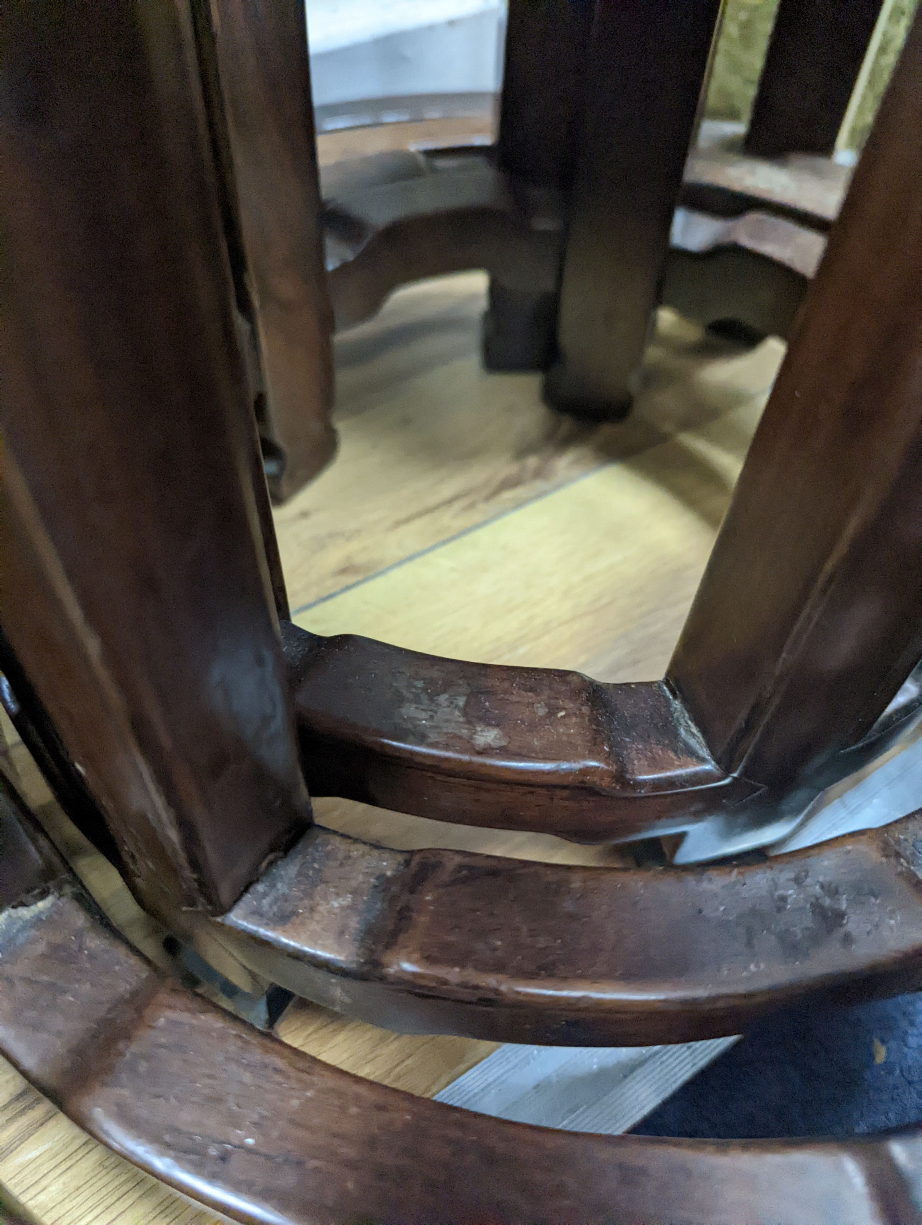 A nest of four Chinese hardwood circular tables, largest diameter 40cm, height 67cm